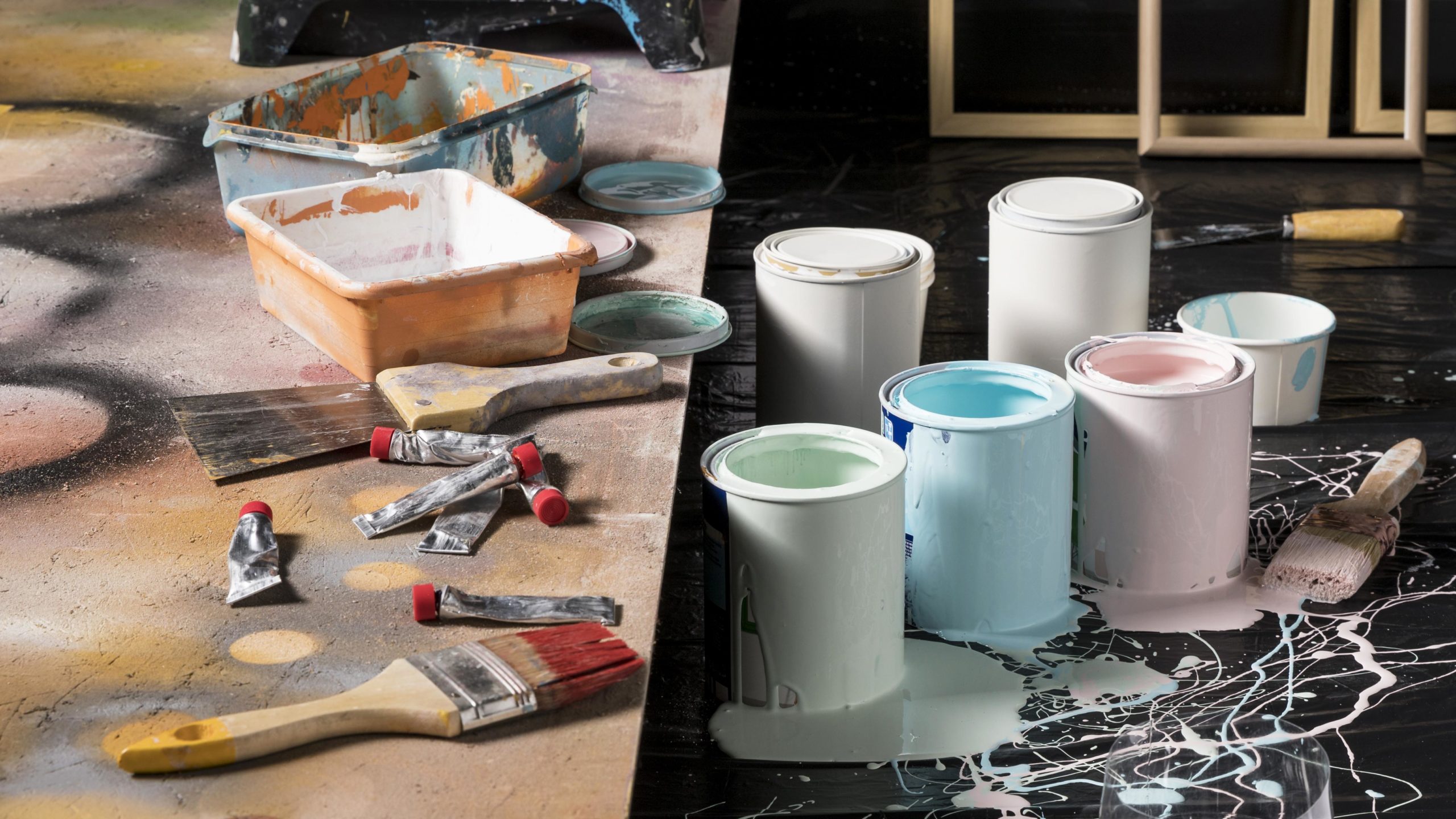 high-angle-colored-paint-cans-studio
